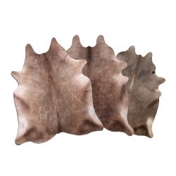 LG/XL Brazilian Dark Champagne cowhide rugs. Measures approx. 42.5-50 square feet